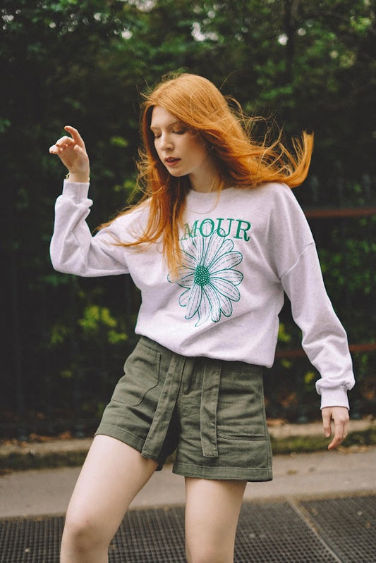 Daisy print sweatshirt with “AMOUR”
